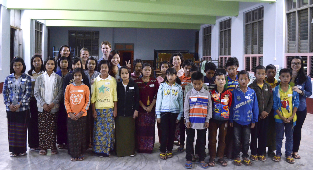 Sam Shugart (’15), Nway Khine (’15), Katie Schirmer (’17) and Ira Yeap (’14) with a group of their students in Myanmar. 