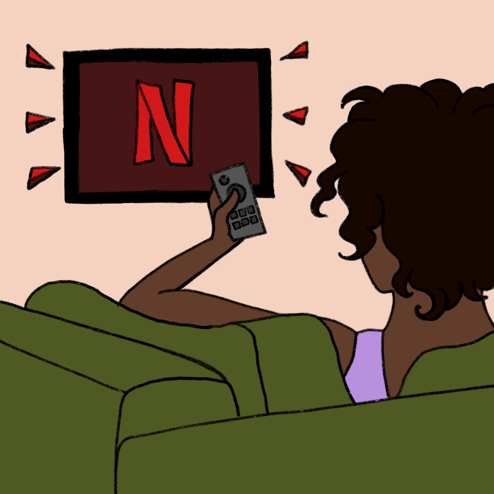 A person watches Netflix on a couch