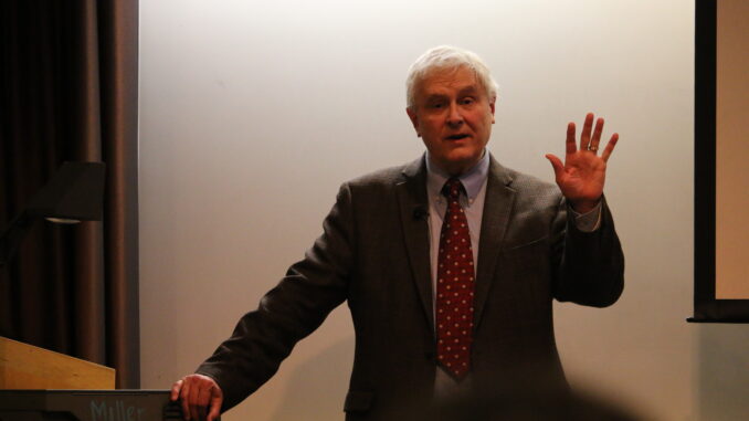 Photograph of guest lecturer Timothy Cheek at podium