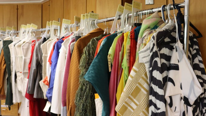 Costumes hanging on a rack.